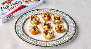 An image of prepared Baked Brie & Fig Puff Pastry Bites.